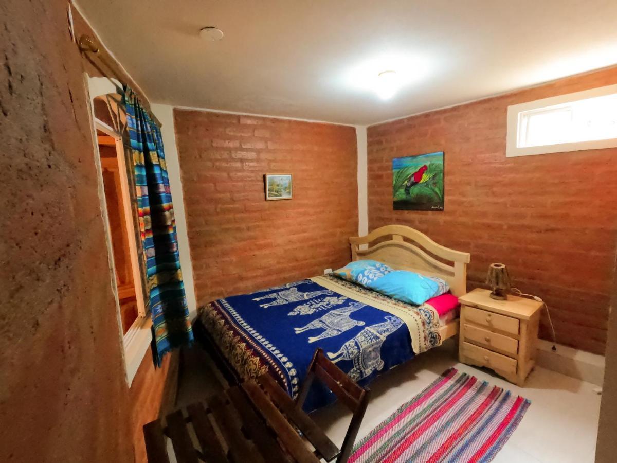 Hostal La Casa Amarilla City บาญอส ภายนอก รูปภาพ