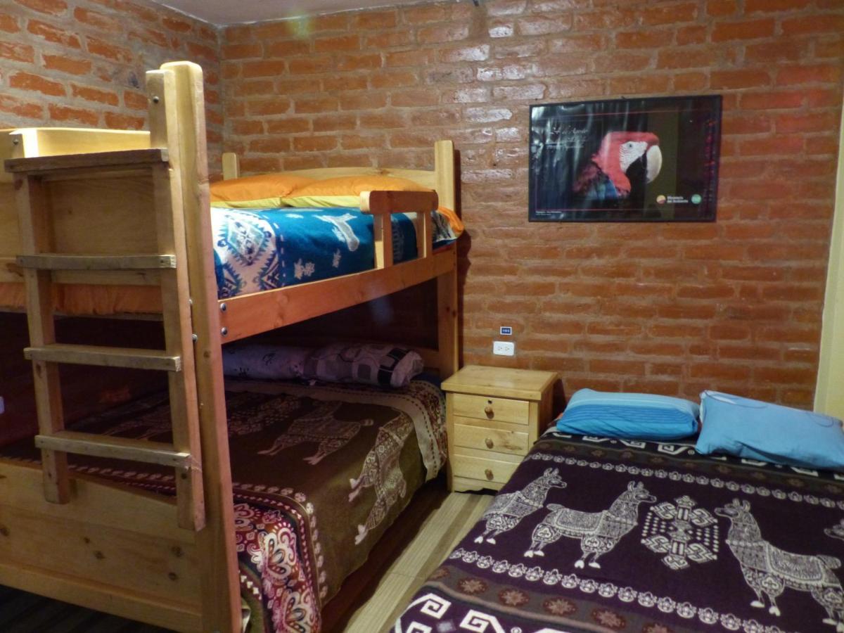 Hostal La Casa Amarilla City บาญอส ภายนอก รูปภาพ