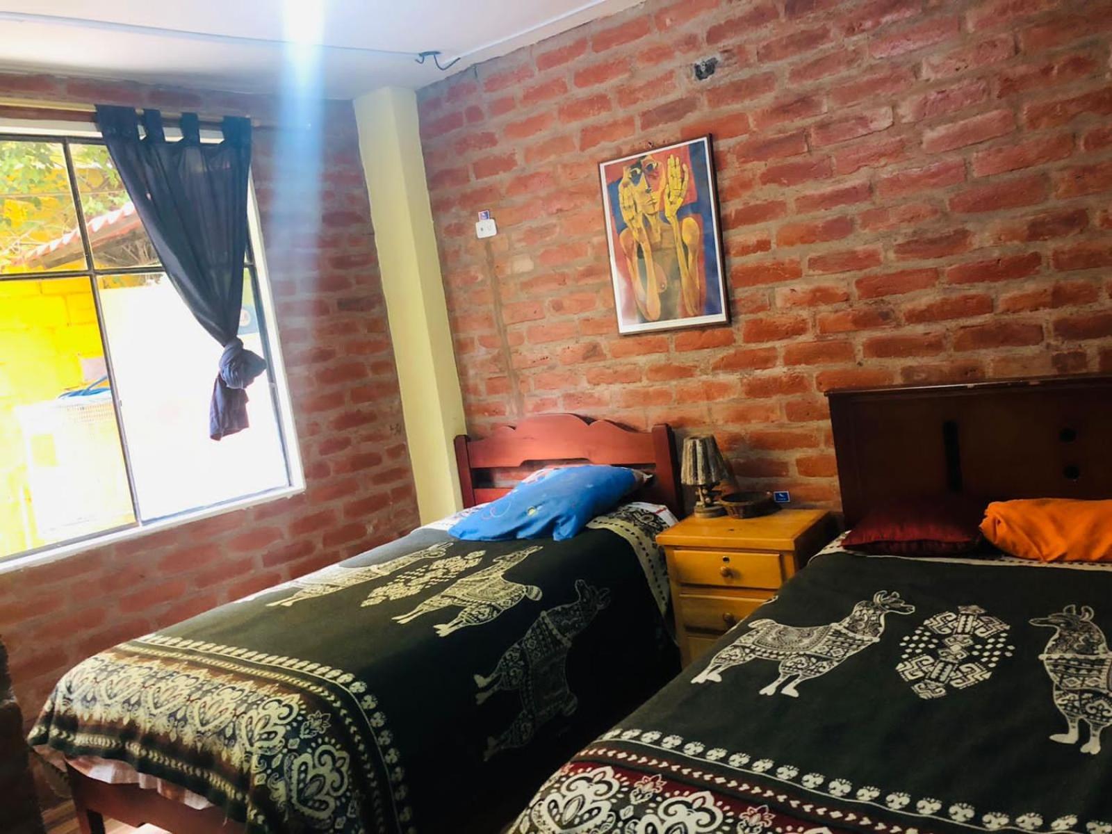 Hostal La Casa Amarilla City บาญอส ภายนอก รูปภาพ