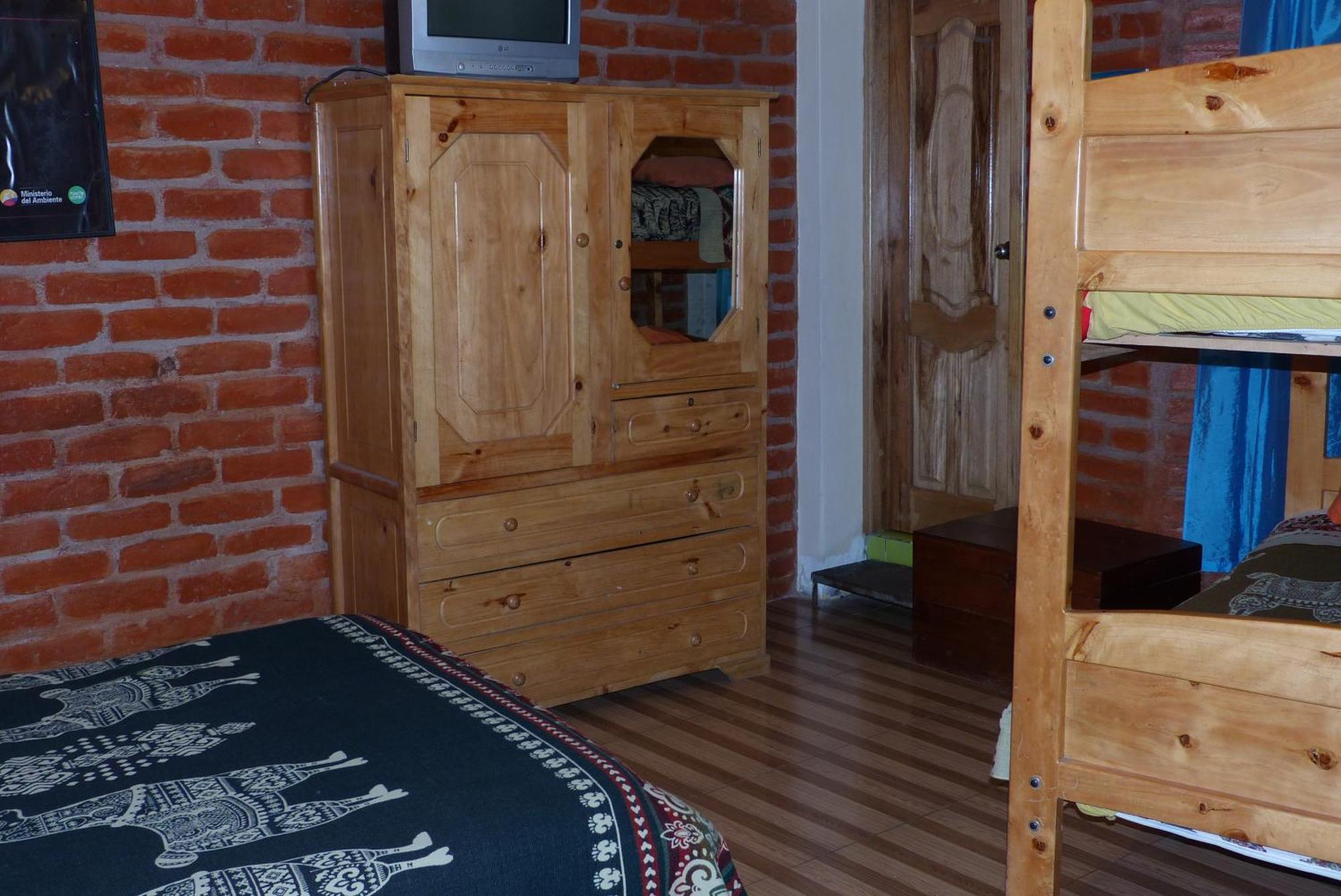 Hostal La Casa Amarilla City บาญอส ภายนอก รูปภาพ