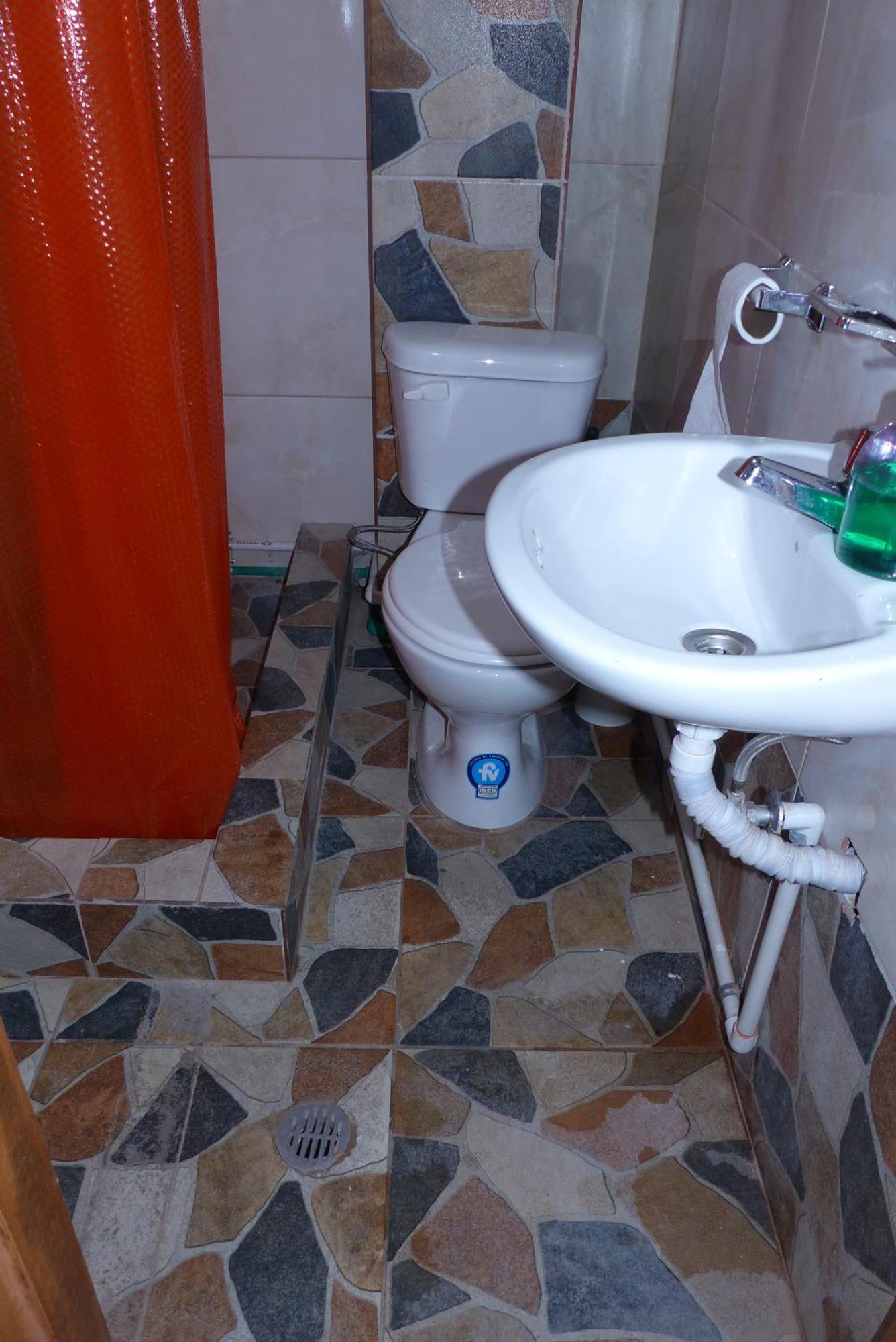 Hostal La Casa Amarilla City บาญอส ภายนอก รูปภาพ