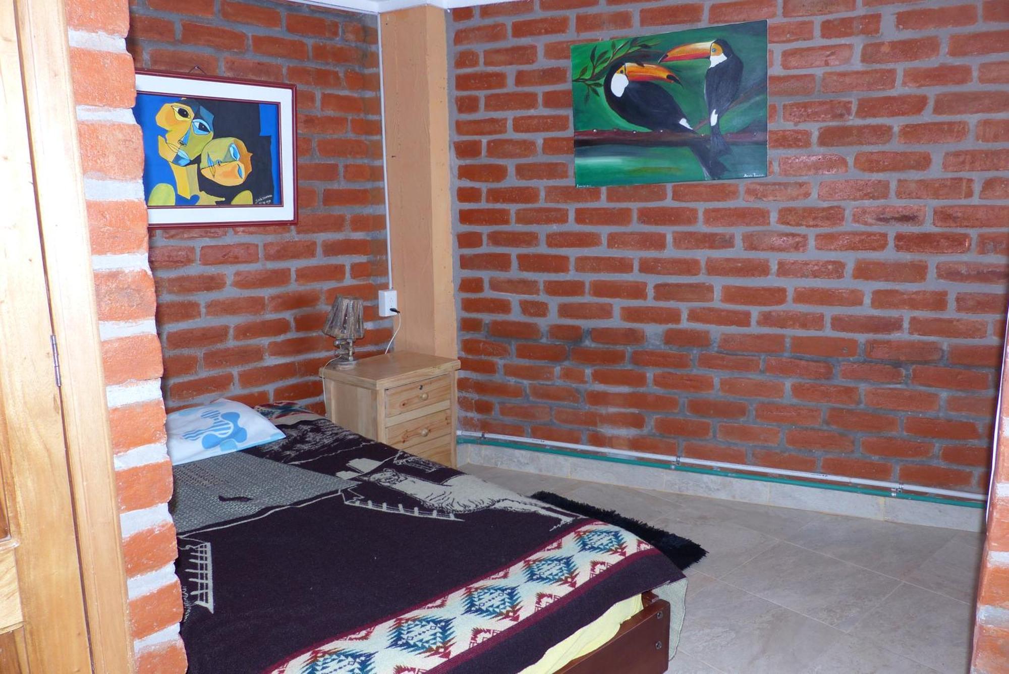 Hostal La Casa Amarilla City บาญอส ภายนอก รูปภาพ