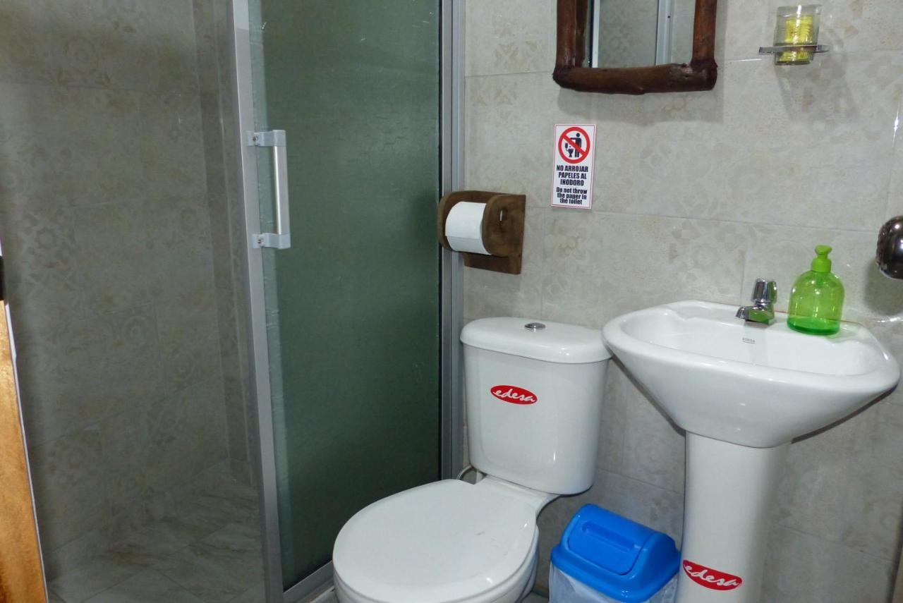 Hostal La Casa Amarilla City บาญอส ภายนอก รูปภาพ