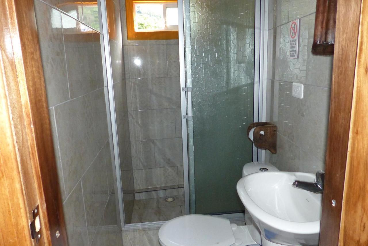 Hostal La Casa Amarilla City บาญอส ภายนอก รูปภาพ