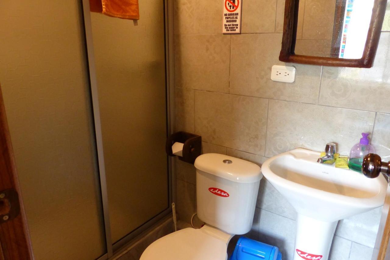 Hostal La Casa Amarilla City บาญอส ภายนอก รูปภาพ