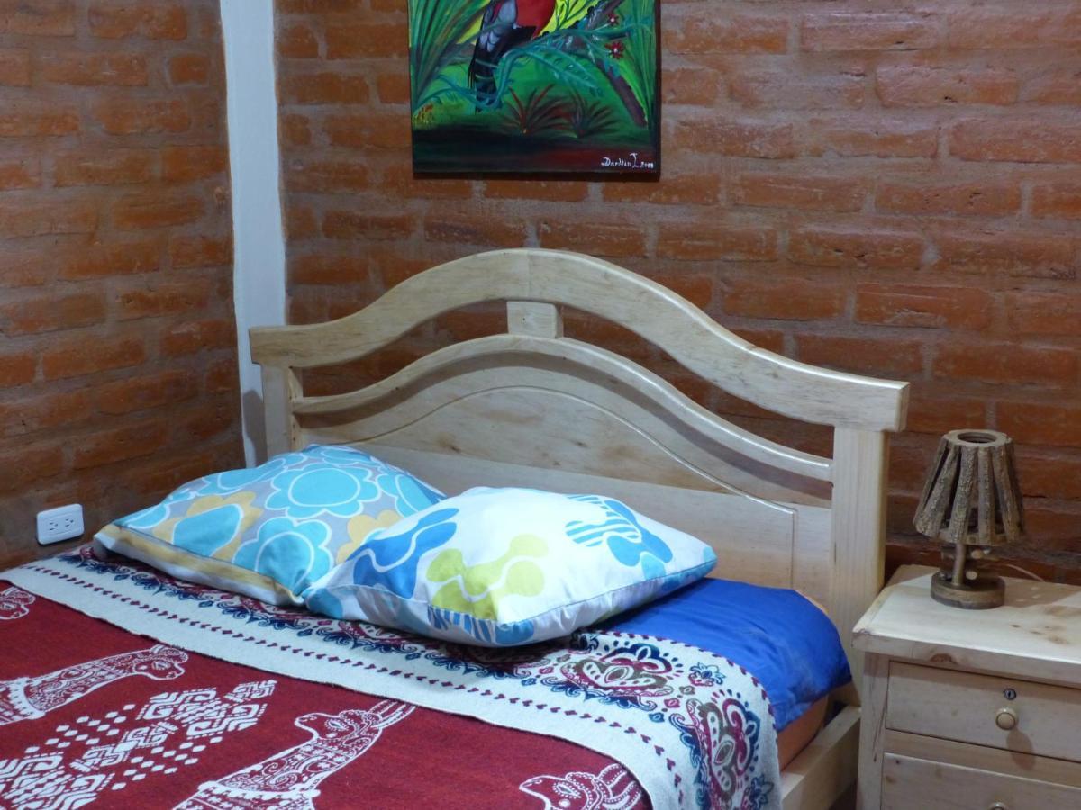 Hostal La Casa Amarilla City บาญอส ภายนอก รูปภาพ