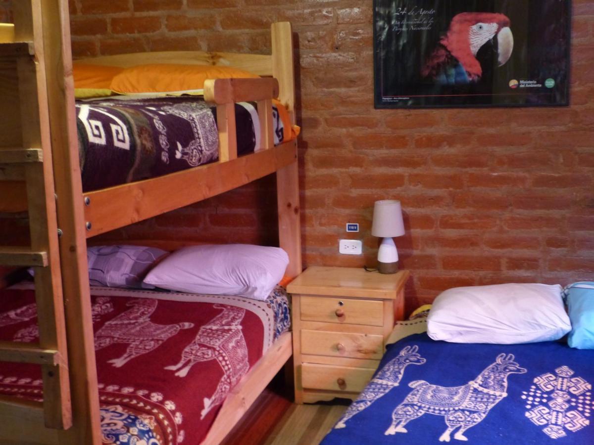 Hostal La Casa Amarilla City บาญอส ภายนอก รูปภาพ