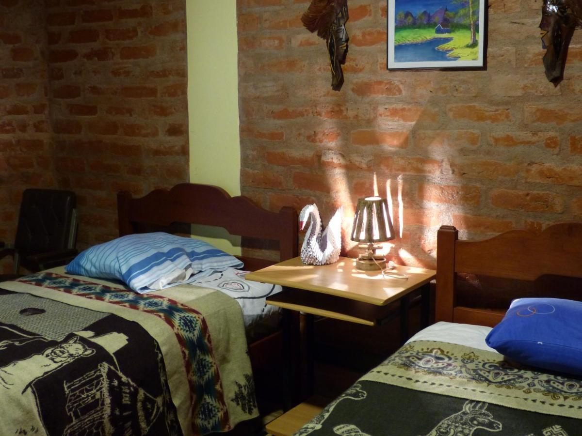 Hostal La Casa Amarilla City บาญอส ภายนอก รูปภาพ